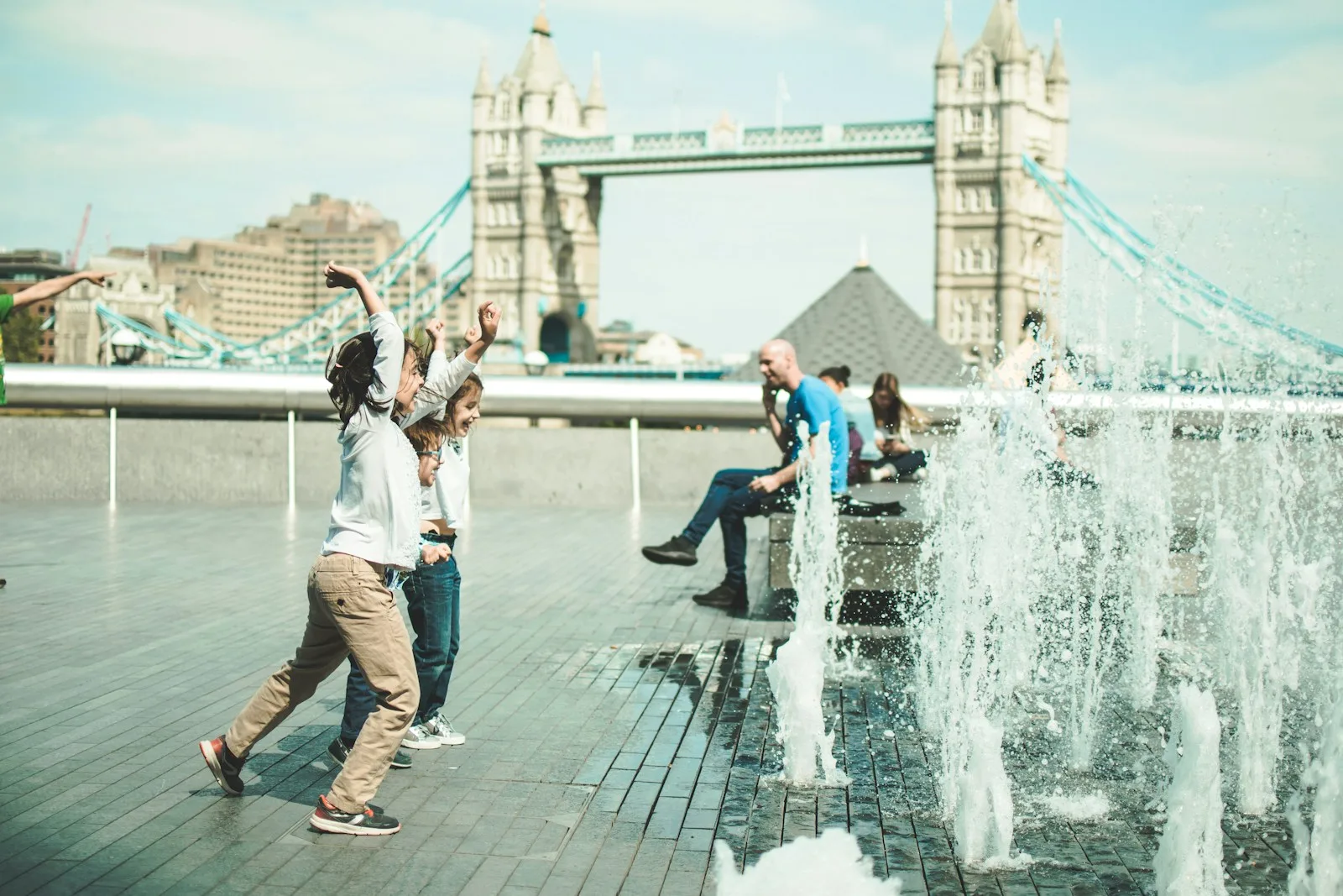 children playing near fountain in uk